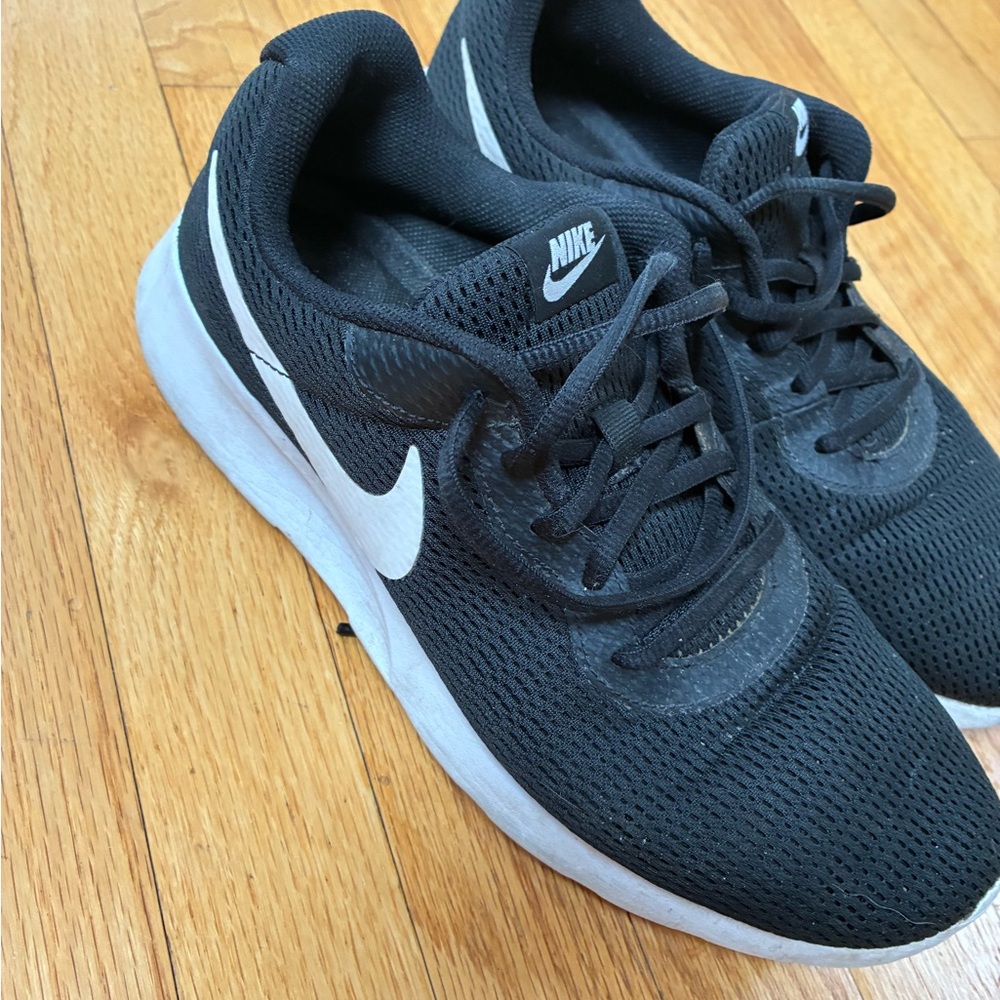 Nike Black Mesh Sneakers with White Swoosh